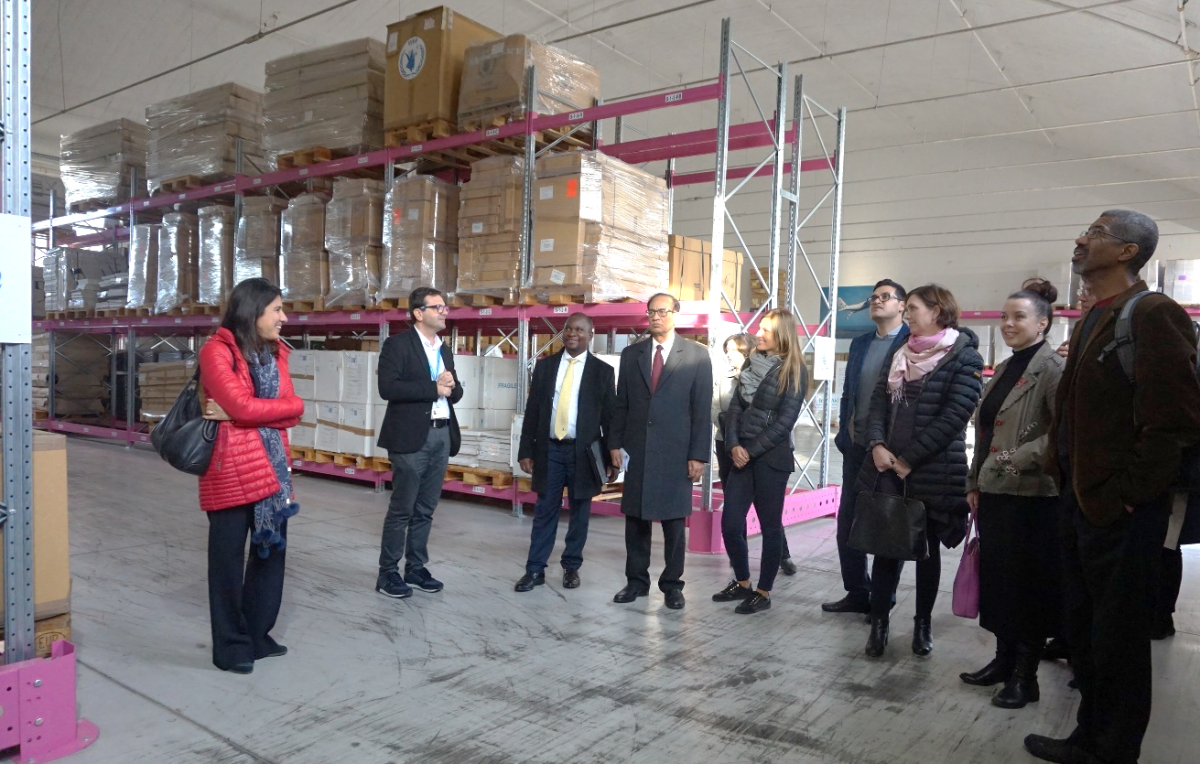 Admiring the well-organized UNHRD warehouse. 
