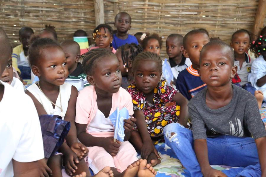 Young children sit together in the classroom at a school in the Kolda Region of Senegal, during a visit by members of the delegation on the joint field visit of the Executive Boards of UNICEF, UNDP/UNFPA/UNOPS, WFP and UN Women. © UNICEF/UNI454514/ALBG Communication