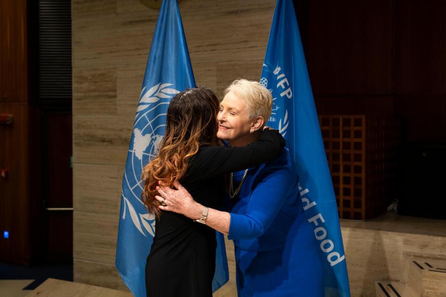Ms. Cindy McCain, Executive Director of the United Nations World Food Programme delivers certificated of appreciation to the outgoing members of the Executive Board. The delegate of Italy. Photo credit: WFP/Matteo Minnella