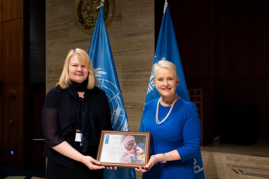 Ms. Cindy McCain, Executive Director of the United Nations World Food Programme delivers certificated of appreciation to the outgoing members of the Executive Board. H.E. Ms. Tanja Grén, Minister Counsellor and Permanent Representative of Finland. Photo credit: WFP/Matteo Minnella