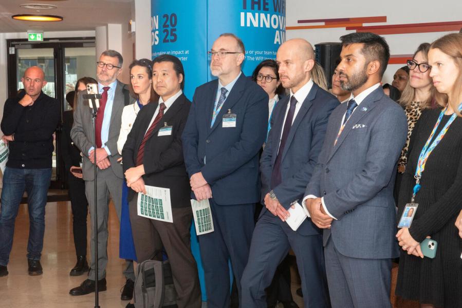 Launch of the exhibit: Ensuring safe and dignified access to food: WFP's protection from sexual exploitation and abuse journey.  Presented by, Mr. Dominik Heinrich, Director, WFP Innovation Division  Ms. Margot van der Velden, WFP Regional Director Western Africa.  H.E. Mr. Andreas Von Brandt, Ambassador and Permanent Representative of Germany.  Ms. Rania Dagash-Kamara, Assistant Executive Director Partnerships &amp; Innovation Department.  © WFP/Daria Addabbo