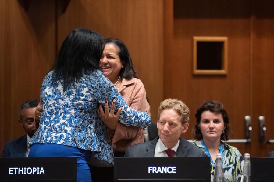 Ms. Valerie Guarnieri, Assistant Executive Director, Programme Operations Department  and H.E. Ms. Demitu Hambisa Bonsa, Ambassador Extraordinary and Plenipotentiary and Permanent Representative of Ethiopia. exchange a hug after the approval of the Ethiopia country programme. © WFP/Daria Addabbo