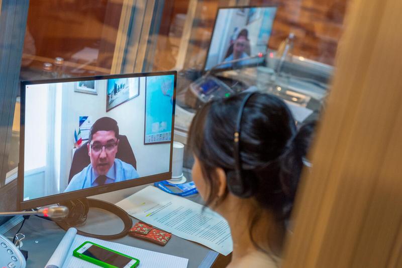 WFP HQ Rome, Italy, 25 June 2021 - In the Photo: interpreter at work during the intervention by H.E. Mr. Nuriddin Kushnazarov, Deputy Permanent Representative Uzbekistan - (connected remotely). - Photo: WFP/Giulio D'Adamo