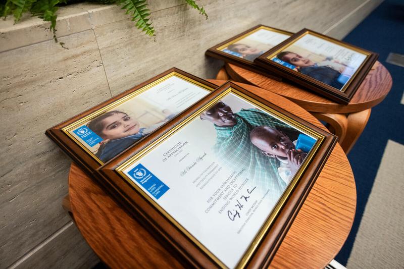Certificates of appreciation for outgoing EB members. Photo credit: WFP/Matteo Minnella