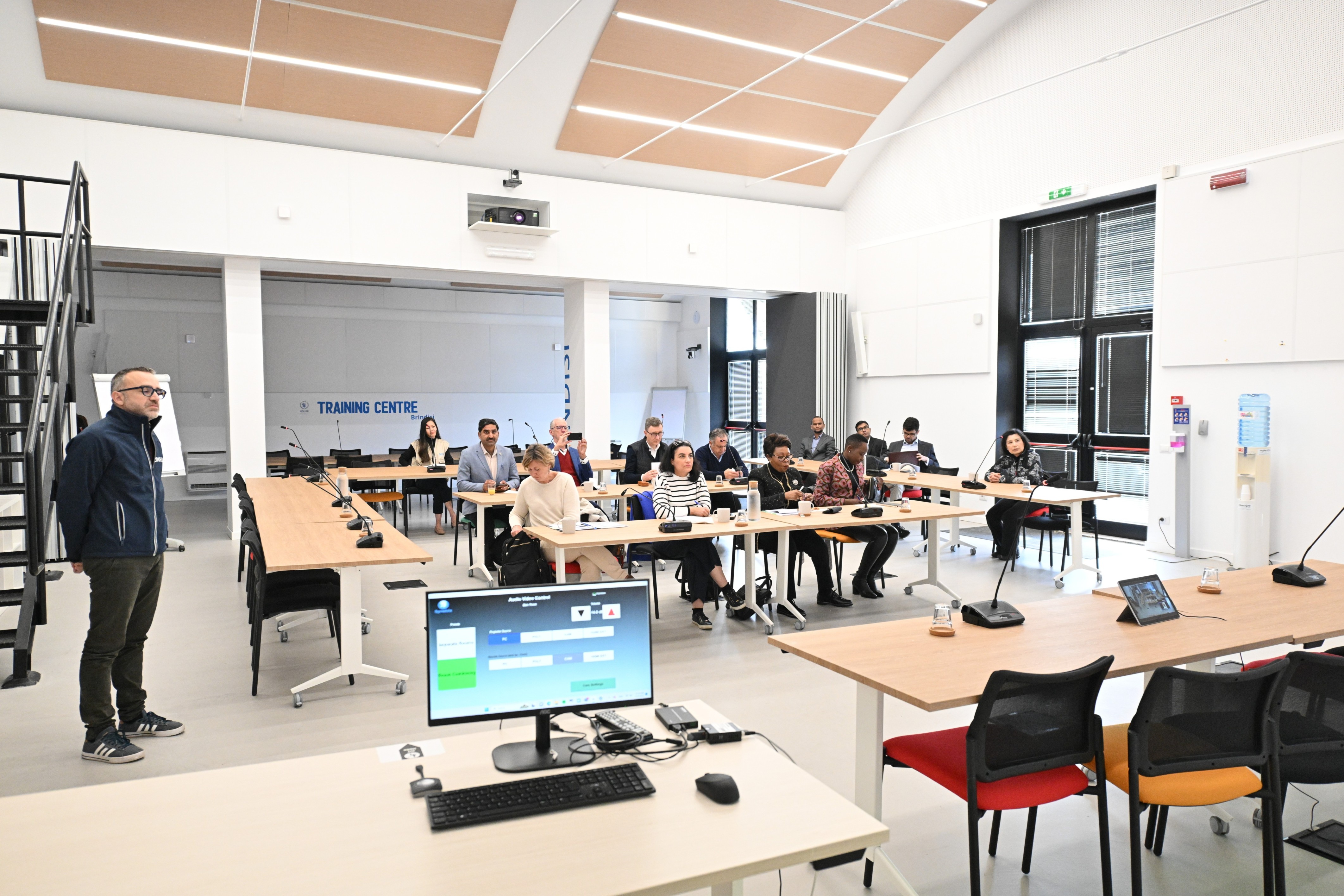 Figure 2: The delegation listened attentively to the welcome address by Walid Ibrahim, UNHRD Network Coordinator and Brindisi Hub Manager in a classroom-style setting at the training centre