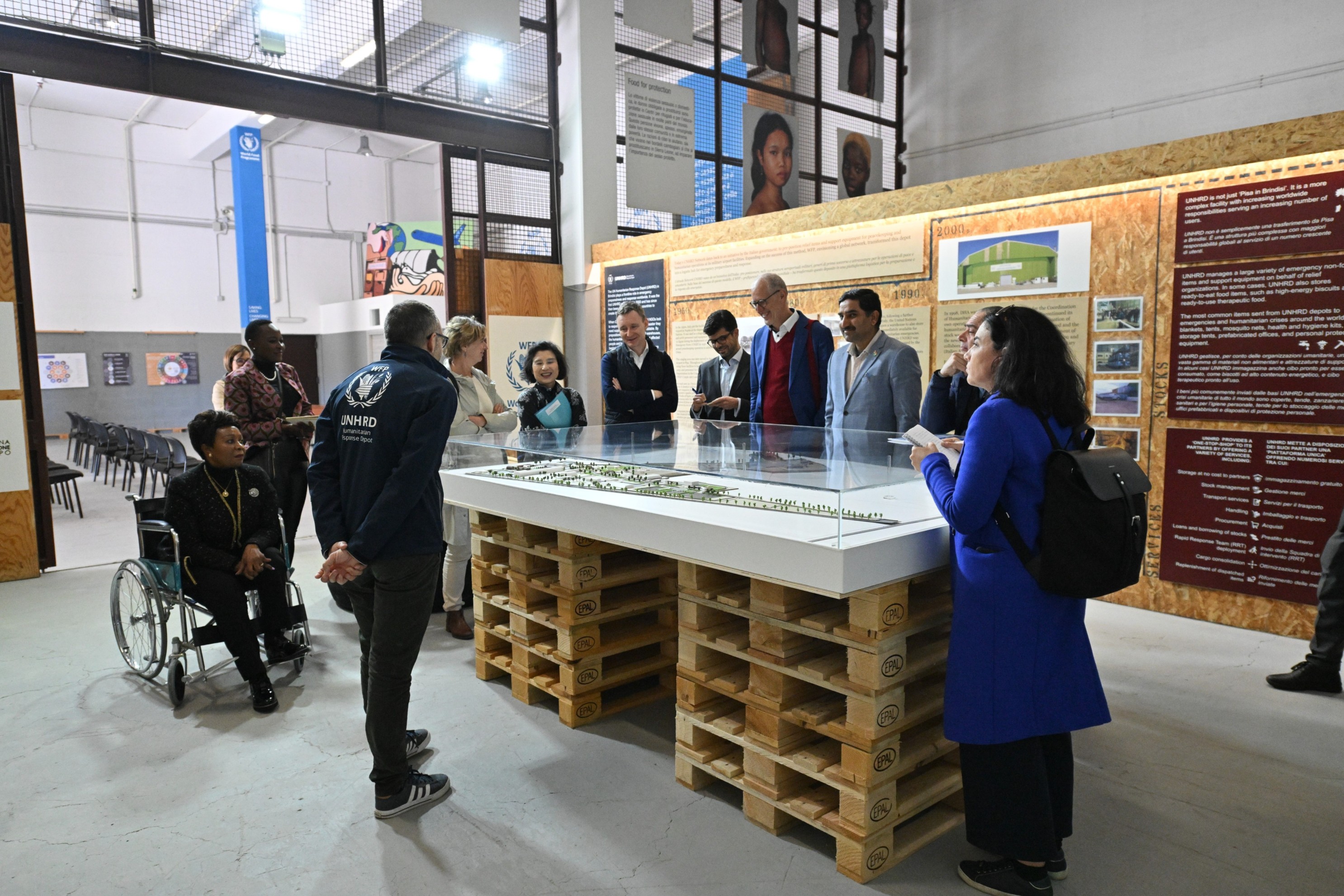 Figure 3: Visit to the UNHRD Museum, where the delegation learned about the upgrade and expansion plan for the Hub around a 3D model of the site  