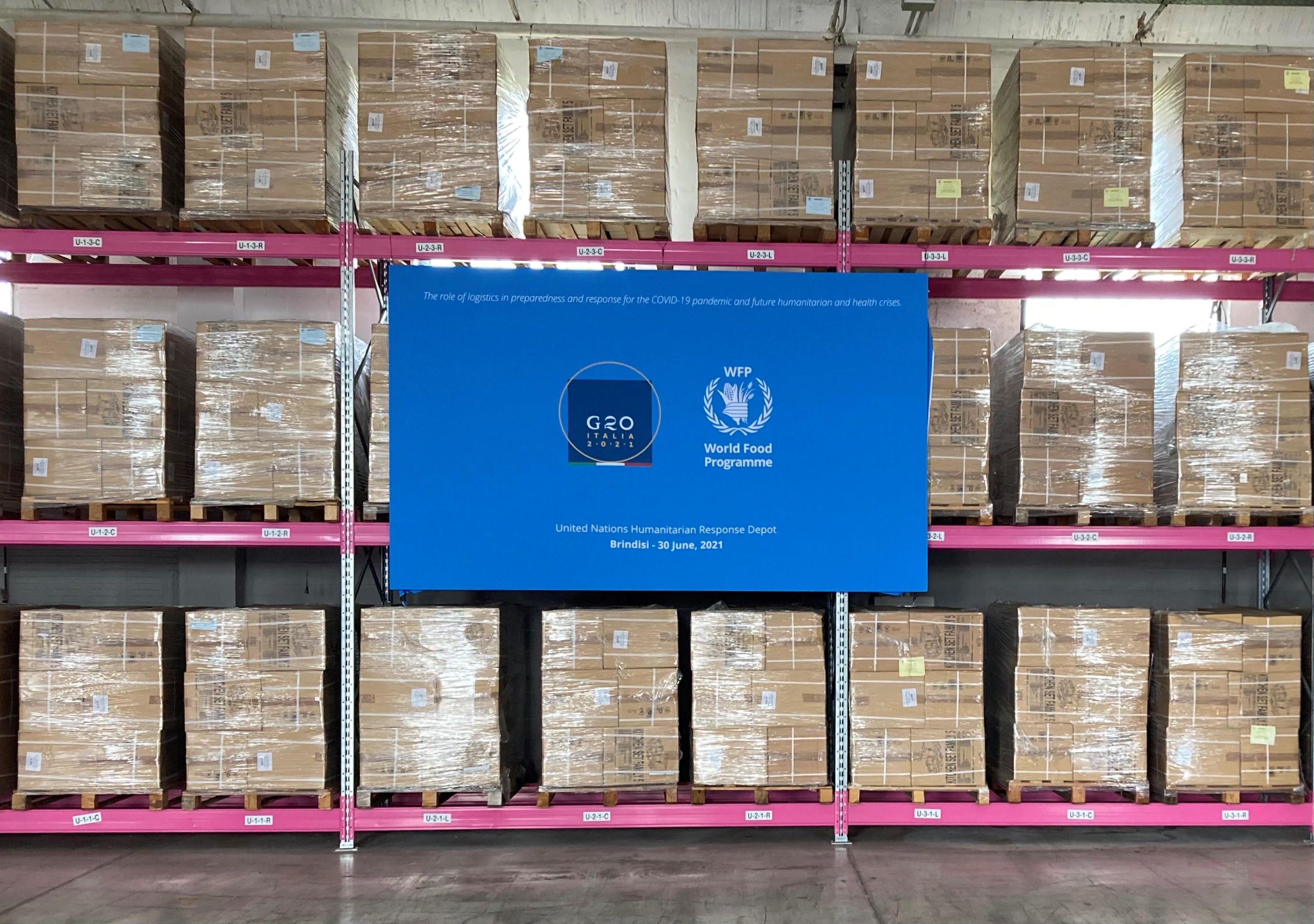Figure 4: A view of the main warehouse, where a banner for the 2021 G20 Development Ministerial Session was displayed – a reminder of the event that took place in Brindisi just two years ago 
